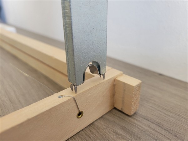 Tool for nailing distance brackets