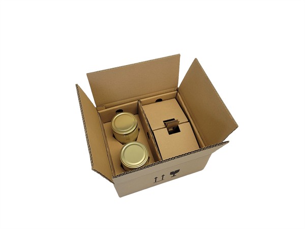 Packaging box with inlays for 4 jars