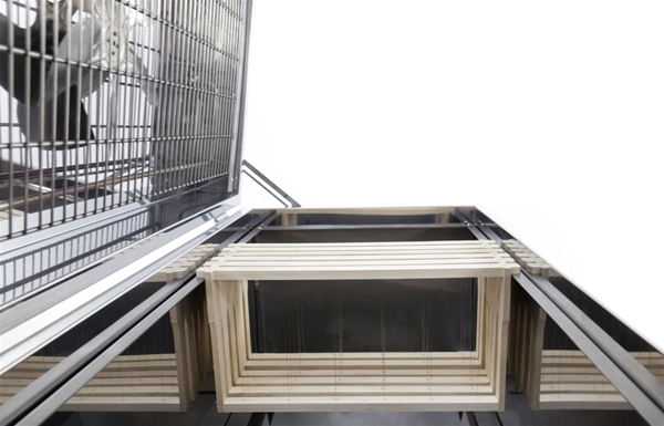 Frame holder for uncapping wax melter